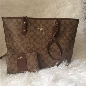 Coach brown and Tan tote with wristlet.